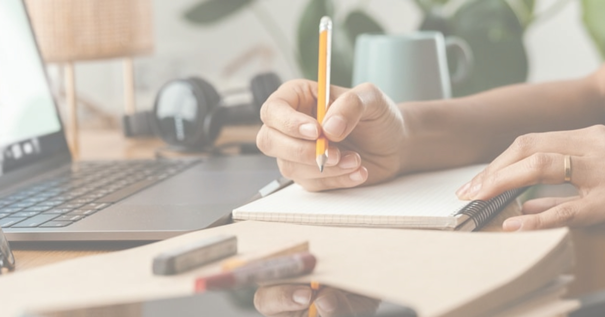 copywriters in harrogate lead image of woman writing in notebook