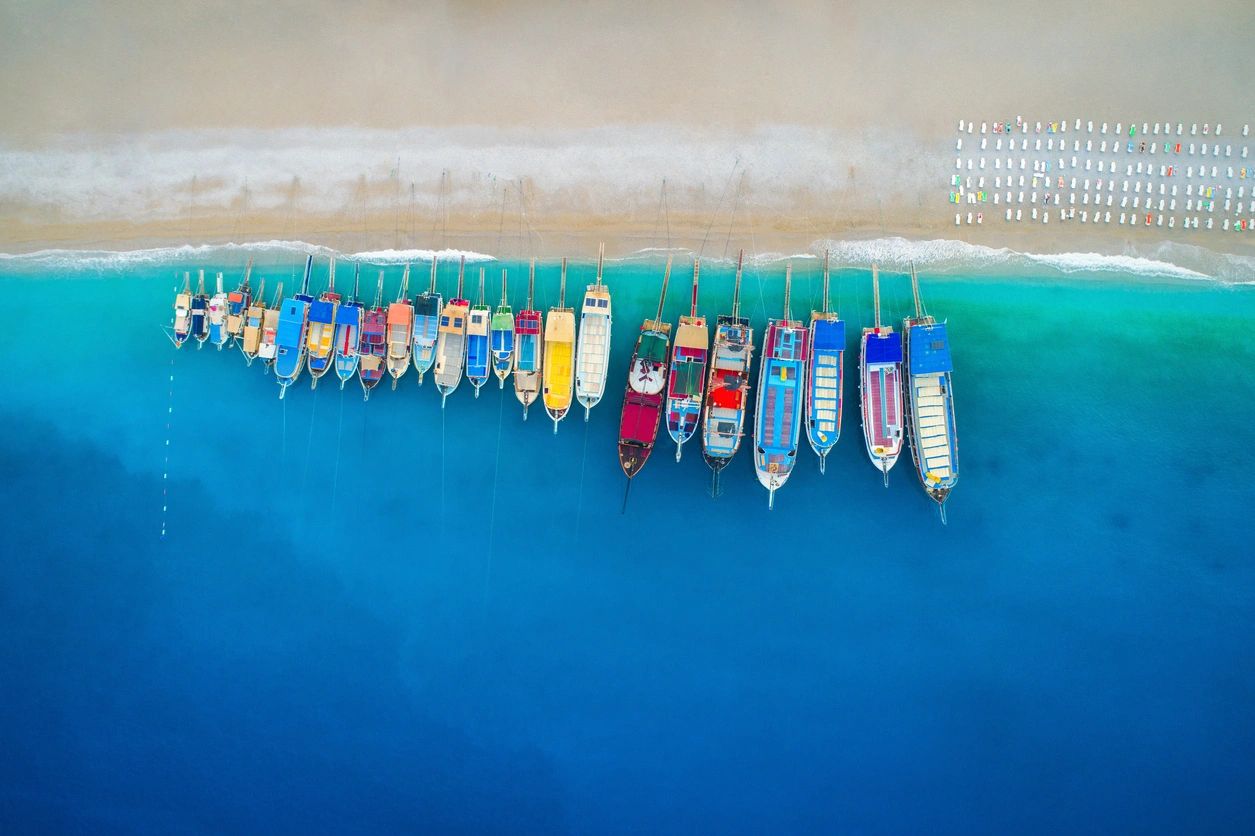 amazing writers in leeds image of boats on a beach